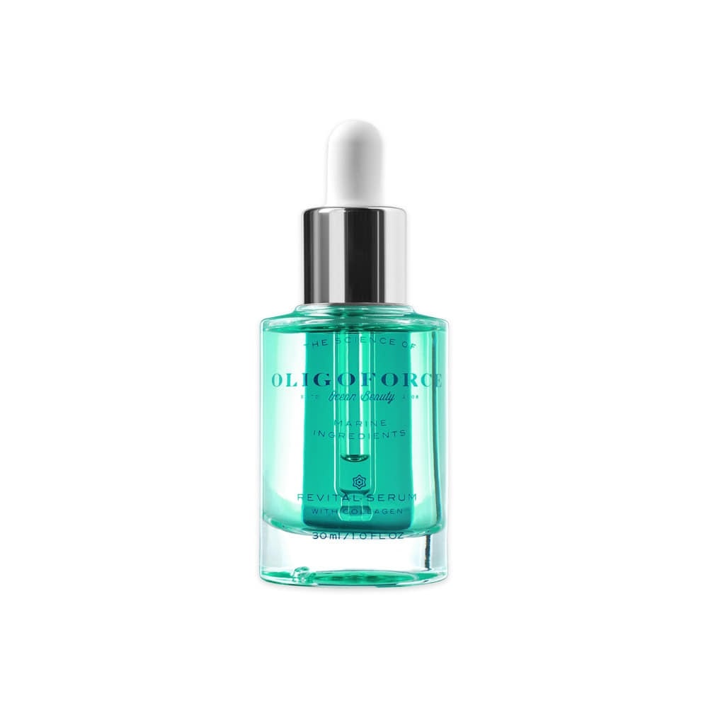 A bottle of serum with a silver cap.