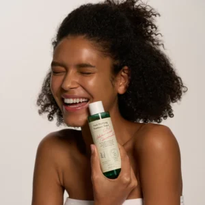 black lady happy with AXIS-Y Daily Purifying Treatment Toner